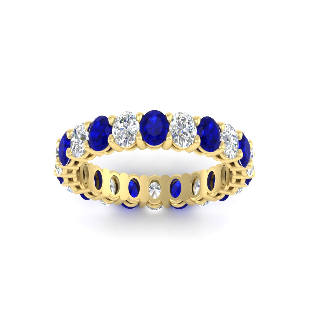3-carat-oval-diamond-full-eternity-band-with-blue-saphhire-in-yellow-gold-fdewb8324ovgsablangle5-4.00x3.00mm-nl-yg