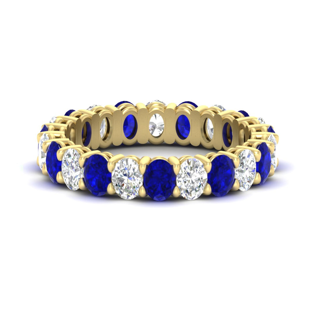 3-carat-oval-diamond-full-eternity-band-with-blue-saphhire-in-yellow-gold-fdewb8324ovgsablsleep-4.00x3.00mm-nl-yg