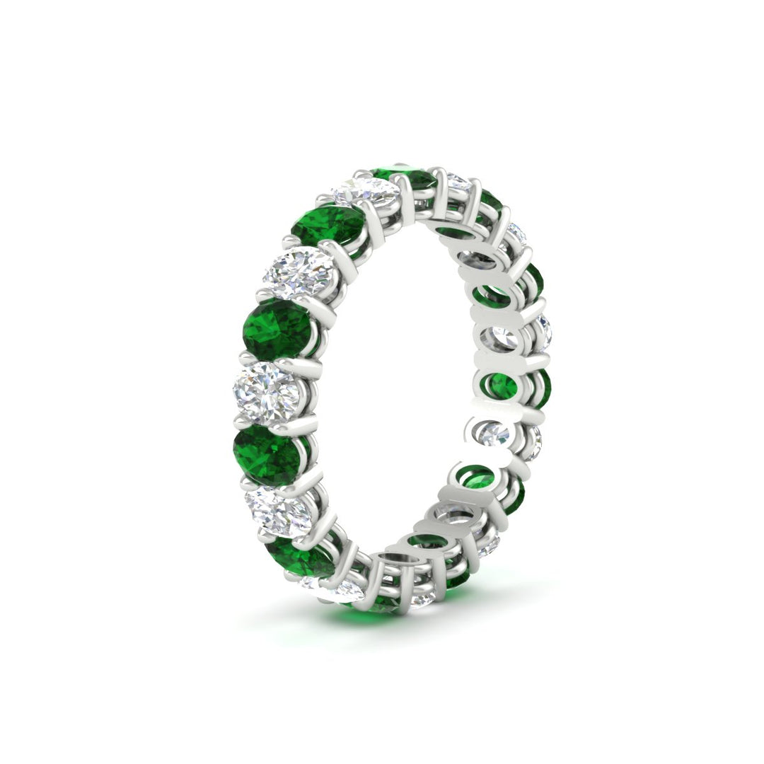 3-carat-oval-diamond-full-eternity-band-with-emerald-in-white-gold-fdewb8324ovgemgrangle2-4.00x3.00mm-nl-wg