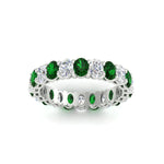 Load image into Gallery viewer, 3-carat-oval-diamond-full-eternity-band-with-emerald-in-white-gold-fdewb8324ovgemgrangle5-4.00x3.00mm-nl-wg