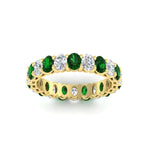 Load image into Gallery viewer, 3-carat-oval-diamond-full-eternity-band-with-emerald-in-yellow-gold-fdewb8324ovgemgrangle5-4.00x3.00mm-nl-yg