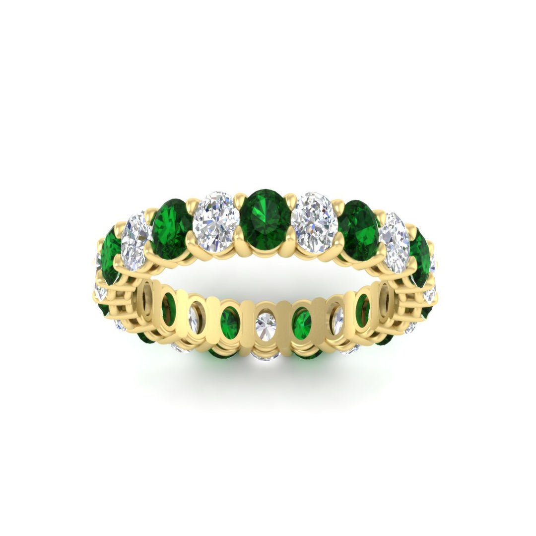 3-carat-oval-diamond-full-eternity-band-with-emerald-in-yellow-gold-fdewb8324ovgemgrangle5-4.00x3.00mm-nl-yg
