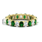 Load image into Gallery viewer, 3-carat-oval-diamond-full-eternity-band-with-emerald-in-yellow-gold-fdewb8324ovgemgrsleep-4.00x3.00mm-nl-yg-hw