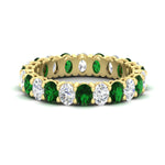 Load image into Gallery viewer, 3-carat-oval-diamond-full-eternity-band-with-emerald-in-yellow-gold-fdewb8324ovgemgrsleep-4.00x3.00mm-nl-yg