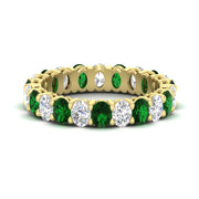 3-carat-oval-diamond-full-eternity-band-with-emerald-in-yellow-gold-fdewb8324ovgemgrsleep-4.00x3.00mm-nl-yg
