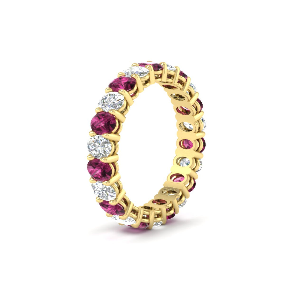 3-carat-oval-diamond-full-eternity-band-with-pink-saphhire-in-yellow-gold-fdewb8324ovgsadrpiangle2-4.00x3.00mm-nl-yg