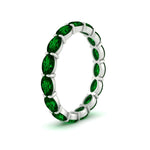 Load image into Gallery viewer, 3-carat-oval-emerald-eternity-ring-in-white-gold-FDEWB8425OVGEMGRANGLE2-3.00CT-NL-WG