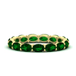 Load image into Gallery viewer, 3-carat-oval-emerald-eternity-ring-in-yellow-gold-FDEWB8425OVGEMGR-3.00CT-NL-YG