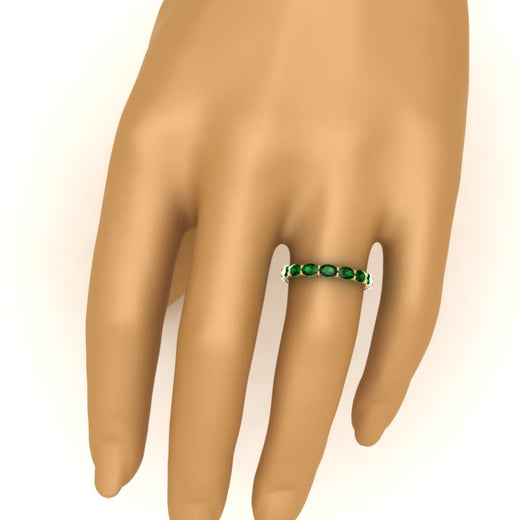 3-carat-oval-emerald-eternity-ring-in-yellow-gold-FDEWB8425OVGEMGRHAND-3.00CT-NL-YG