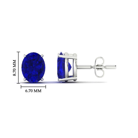 3-carat-oval-shaped-four-prong-sapphire-stud-earring-in-white-gold-fdear10411ovgsablangle2-3.00ct-nl-wg-hw.jpg