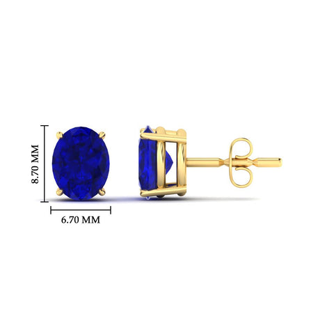 3-carat-oval-shaped-four-prong-sapphire-stud-earring-in-yellow-gold-fdear10411ovgsablangle2-3.00ct-nl-yg-hw.jpg