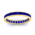 Load image into Gallery viewer, 3-carat-princess-cut-women_s-eternity-sapphire-wedding-band-in-yellow-gold-FDEWB160PRBGSABLANGLE5-3.00CT-NL-YG.jpg?v=1766128419