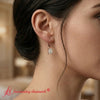 Load image into Gallery viewer, 3-ct-emerald-cut-diamond-drop-earrings-in-rose-gold-fdear11236em-model-1