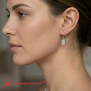 3-ct-emerald-cut-diamond-drop-earrings-in-white-gold-fdear11236em-model