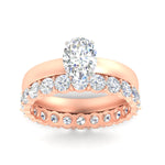 Load image into Gallery viewer, 3-mm-oval-shaped-solitaire-ring-with-eternity-band-in-rose-gold-fdens11590ovangle5-3.00mm-nl-rg_a1f3e3d2-c769-4d8c-a3c8-70e62cfbcdf0.jpg?v=1760334635
