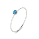 Load image into Gallery viewer, 3-prong-round-blue-topaz-tiny-band-ring-in-white-gold-fd9389gicbltoangle4-nl-wg.jpg?v=1756441995
