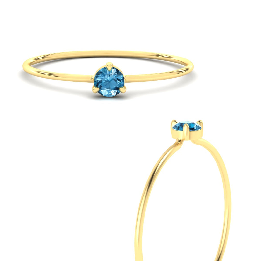 3-prong-round-blue-topaz-tiny-band-ring-in-yellow-gold-fd9389gicbltoangle3-nl-yg.jpg?v=1756441995