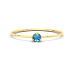 Load image into Gallery viewer, 3-prong-round-blue-topaz-tiny-band-ring-in-yellow-gold-fd9389gicbltosleep-nl-yg.jpg?v=1756441995
