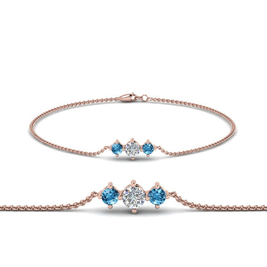 3-stone-bracelet-for-mothers-with-blue-topaz-in-rose-gold-FDBRC8693GICBLTOMD-NL-RG