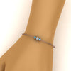 Load image into Gallery viewer, 3-stone-bracelet-for-mothers-with-blue-topaz-in-rose-gold-FDBRC8693GICBLTOMDHAND-NL-RG