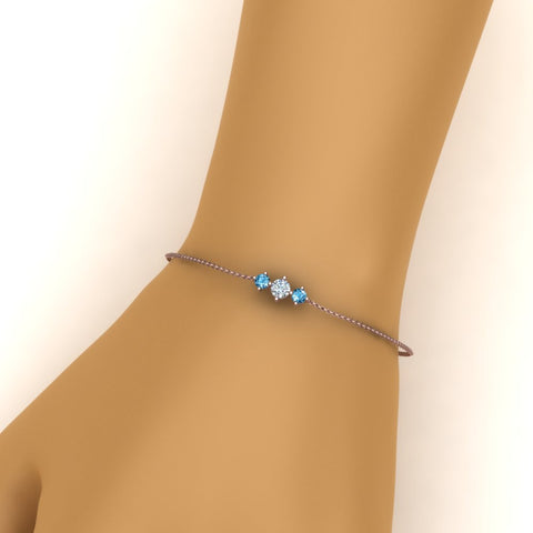 3-stone-bracelet-for-mothers-with-blue-topaz-in-rose-gold-FDBRC8693GICBLTOMDHAND-NL-RG