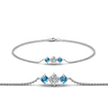 Thumbnail 80 - 3-stone-bracelet-for-mothers-with-blue-topaz-in-white-gold-FDBRC8693GICBLTOMD-NL-WG
