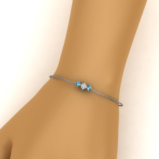 3-stone-bracelet-for-mothers-with-blue-topaz-in-white-gold-FDBRC8693GICBLTOMDHAND-NL-WG