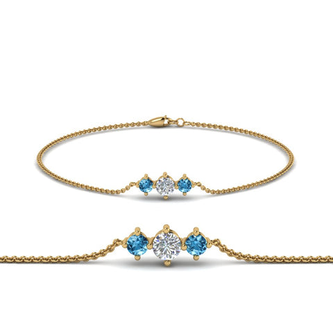 3-stone-bracelet-for-mothers-with-blue-topaz-in-yellow-gold-FDBRC8693GICBLTOMD-NL-YG
