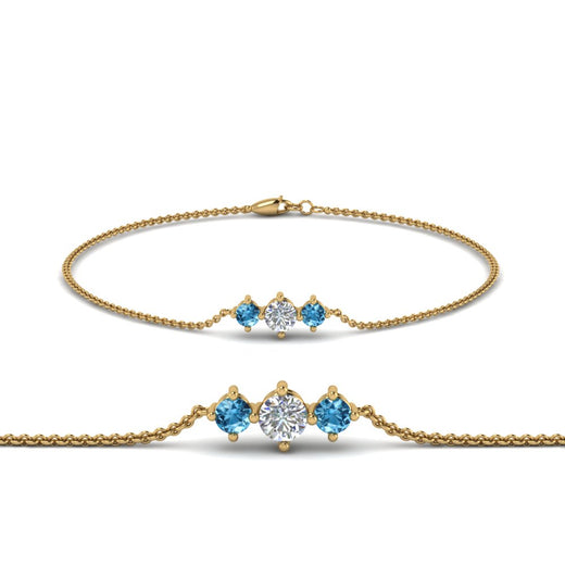 3-stone-bracelet-for-mothers-with-blue-topaz-in-yellow-gold-FDBRC8693GICBLTOMD-NL-YG