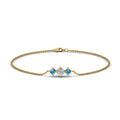 Thumbnail 84 - 3-stone-bracelet-for-mothers-with-blue-topaz-in-yellow-gold-FDBRC8693GICBLTOMDANGLE2-NL-YG