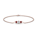 Thumbnail 4 - 3-stone-bracelet-for-mothers-with-ruby-in-rose-gold-FDBRC8693GRUDRMDANGLE2-NL-RG