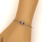 Load image into Gallery viewer, 3-stone-bracelet-for-mothers-with-ruby-in-FDBRC8693GRUDRMD-NL-WG
