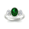 Load image into Gallery viewer, 3-stone-oval-bezel-emerald-engagement-ring-in-white-gold-fd11546gemgr-nl-wg