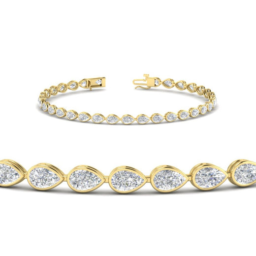 3.30-ct-pear-shape-east-west-bezel-diamond-tennis-bracelet-in-yellow-gold-FDBRCPE10581ANGLE2-3.30CT-NL-YG.jpg?v=1776840892
