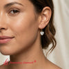 Load image into Gallery viewer, 4-carat-diamond-heart-shape-stud-dangle-earrings-in-yellow-gold-FDEAR11236HT-model