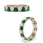Load image into Gallery viewer, 4-carat-heart-eternity-diamond-anniversary-band-with-emerald-in-rose-gold-FDEWB8439GEMGRANGLE3-NL-RG
