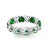 Load image into Gallery viewer, 4-carat-heart-eternity-diamond-anniversary-band-with-emerald-in-white-gold-FDEWB8439GEMGRANGLE5-NL-WG