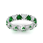 Load image into Gallery viewer, 4-carat-heart-eternity-diamond-anniversary-band-with-emerald-in-white-gold-FDEWB8439GEMGRANGLE5-NL-WG
