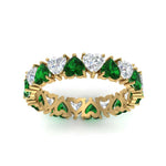Load image into Gallery viewer, 4-carat-heart-eternity-diamond-anniversary-band-with-emerald-in-yellow-gold-FDEWB8439GEMGRANGLE5-NL-YG
