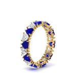 Load image into Gallery viewer, 4-carat-heart-eternity-diamond-anniversary-band-with-sapphire-in-yellow-gold-FDEWB8439GSABLANGLE2-NL-YG

