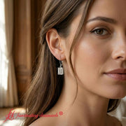4-ct-emerald-cut-diamond-drop-earrings-in-white-gold-fdear11236em-model-1