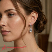 5-ct-emerald-cut-diamond-drop-earrings-in-white-gold-fdear11236em-model