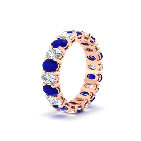 5-ct-oval-diamond-basket-prong-eternity-band-with-blue-sapphire-in-rose-gold-fdewb8324ovgsablangle2-5.00x3.50mm-nl-rg
