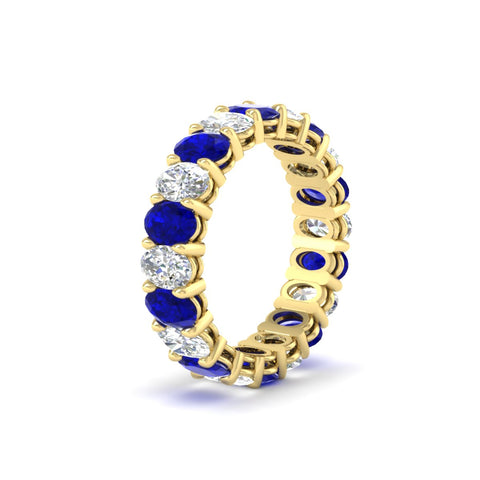5-ct-oval-diamond-basket-prong-eternity-band-with-blue-sapphire-in-yellow-gold-fdewb8324ovgsablangle2-5.00x3.50mm-nl-yg
