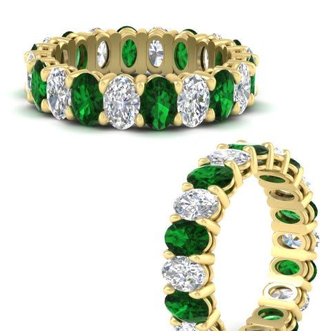 5-ct-oval-diamond-basket-prong-eternity-band-with-emerald-in-yellow-gold-fdewb8324ovgemgrangle3-5.00x3.50mm-nl-yg