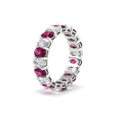 5-ct-oval-diamond-basket-prong-eternity-band-with-pink-sapphire-in-white-gold-fdewb8324ovgsadrpiangle2-5.00x3.50mm-nl-wg