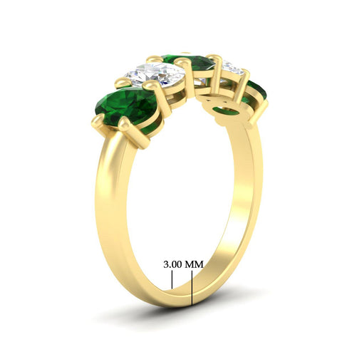 custom-wedding-band5-stone-oval-emerald-custom-wedding-band-3-carat-in-yellow-gold-fdwb8008ovgemgrangle2-3.00ct-nl-yg-hw.jpg