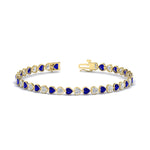 Load image into Gallery viewer, 7-60-ct-bezel-tennis-bracelet-heart-shaped-diamond-with-sapphire-in-yellow-gold-fdbrc10581htgsablangle2-7-60-ct-nl-yg
