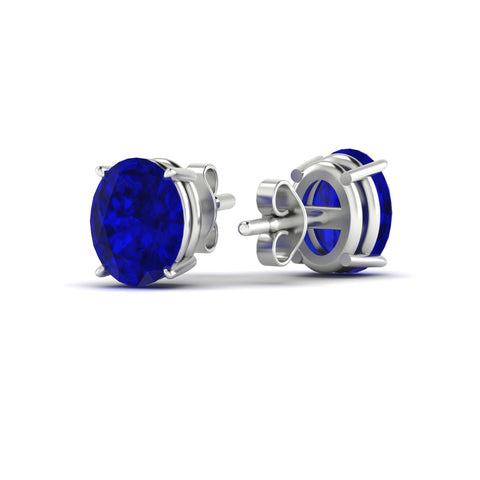 7-carat-oval-shaped-four-prong-sapphire-stud-earring-in-white-gold-fdear10411ovgsablangle4-7.00ct-nl-wg.jpg