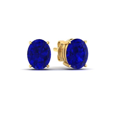 7-carat-oval-shaped-four-prong-sapphire-stud-earring-in-yellow-gold-fdear10411ovgsablangle1-7.00ct-nl-yg.jpg